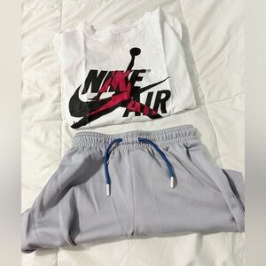 Jordan White T-Shirt with Red Logo set for boys.
Shirt is nwot.